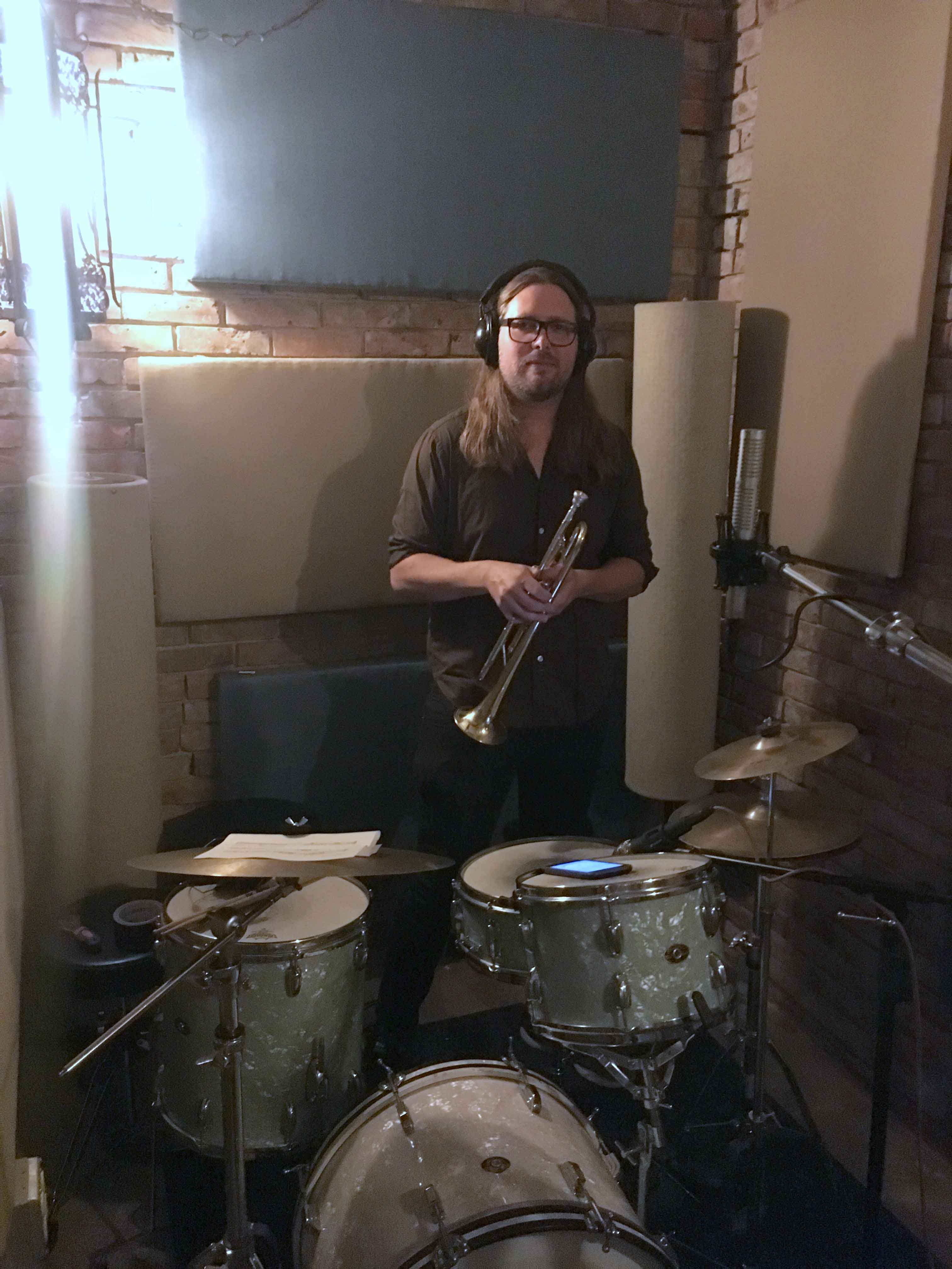 Ian playing trumpet on a new song